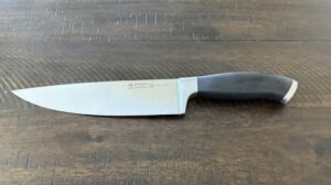 Chef's Knife on wooden surface